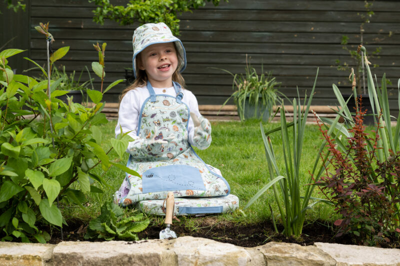 Childs garden sun hat, gardening apron, gloves and kneeler