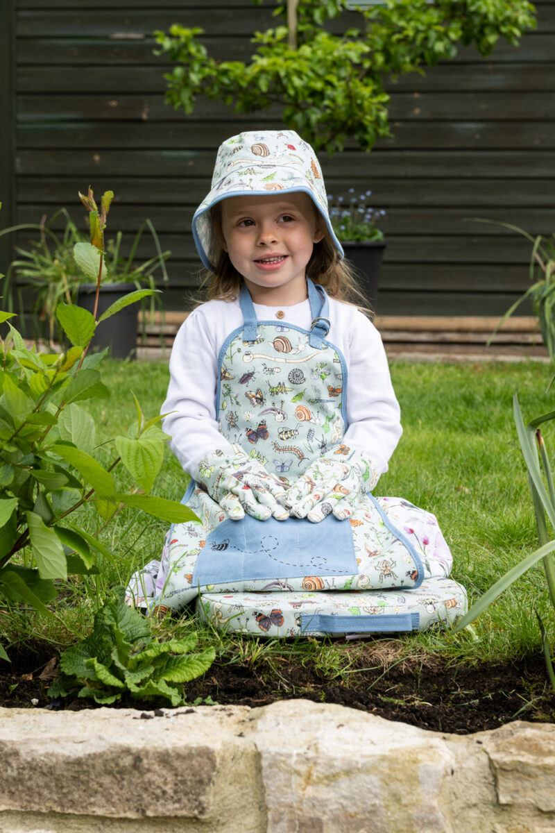 Childs garden sun hat, gardening apron, gloves and kneeler