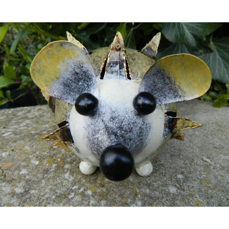 Create a magical garden ambiance with our hedgehog tealight holder